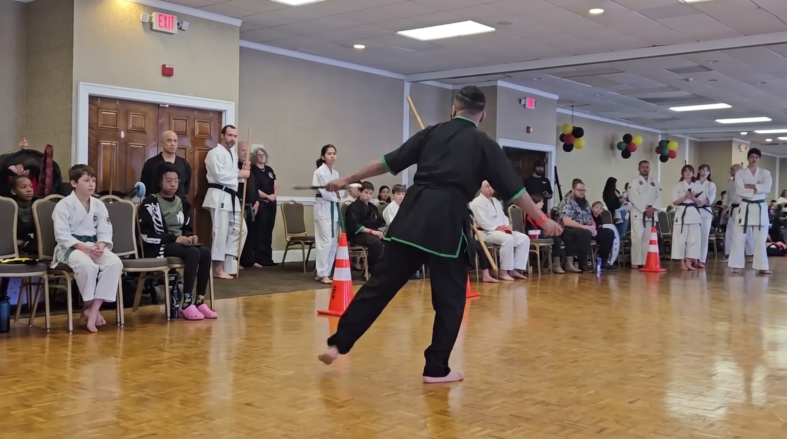 Kung fu form on a wood floor